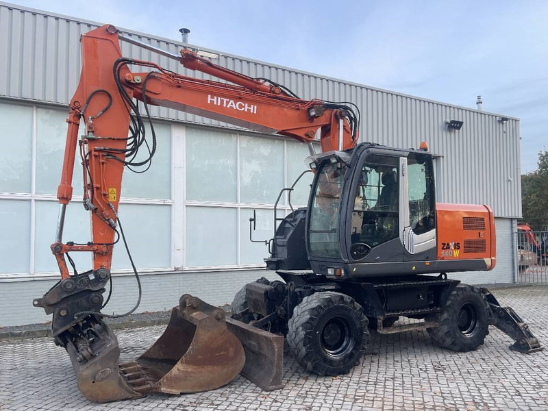 Hitachi ZX 140 W-3 - Pelle sur pneus: photos 2 Hitachi ZX 140 W-3 - Pelle sur pneus: photos 2