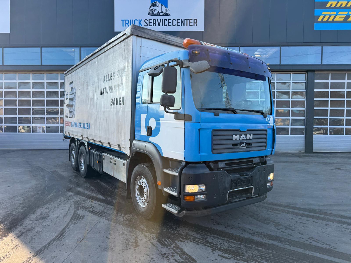 MAN TGA 26.440 6x2 - Camion à rideaux coulissants: photos 3 MAN TGA 26.440 6x2 - Camion à rideaux coulissants: photos 3