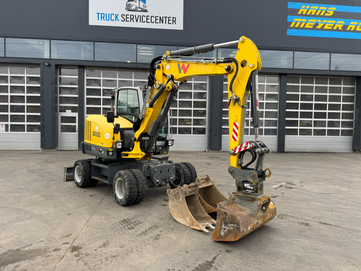 NEUSON EW65 E14-2 Powertilt 3x Schaufeln - Pelle sur pneus: photos 2 NEUSON EW65 E14-2 Powertilt 3x Schaufeln - Pelle sur pneus: photos 2