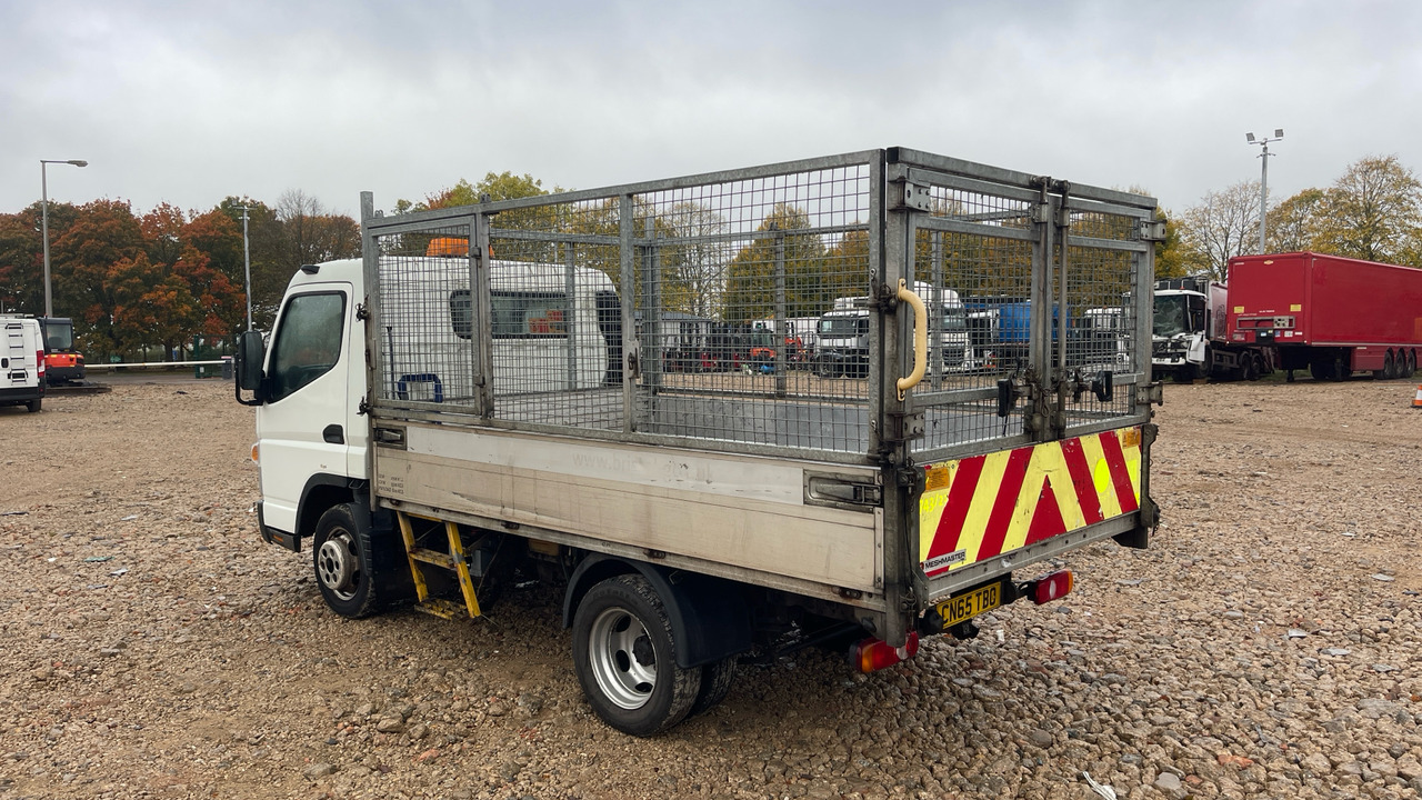 FUSO CANTER 3C13 25 - Utilitaire benne: photos 3 FUSO CANTER 3C13 25 - Utilitaire benne: photos 3