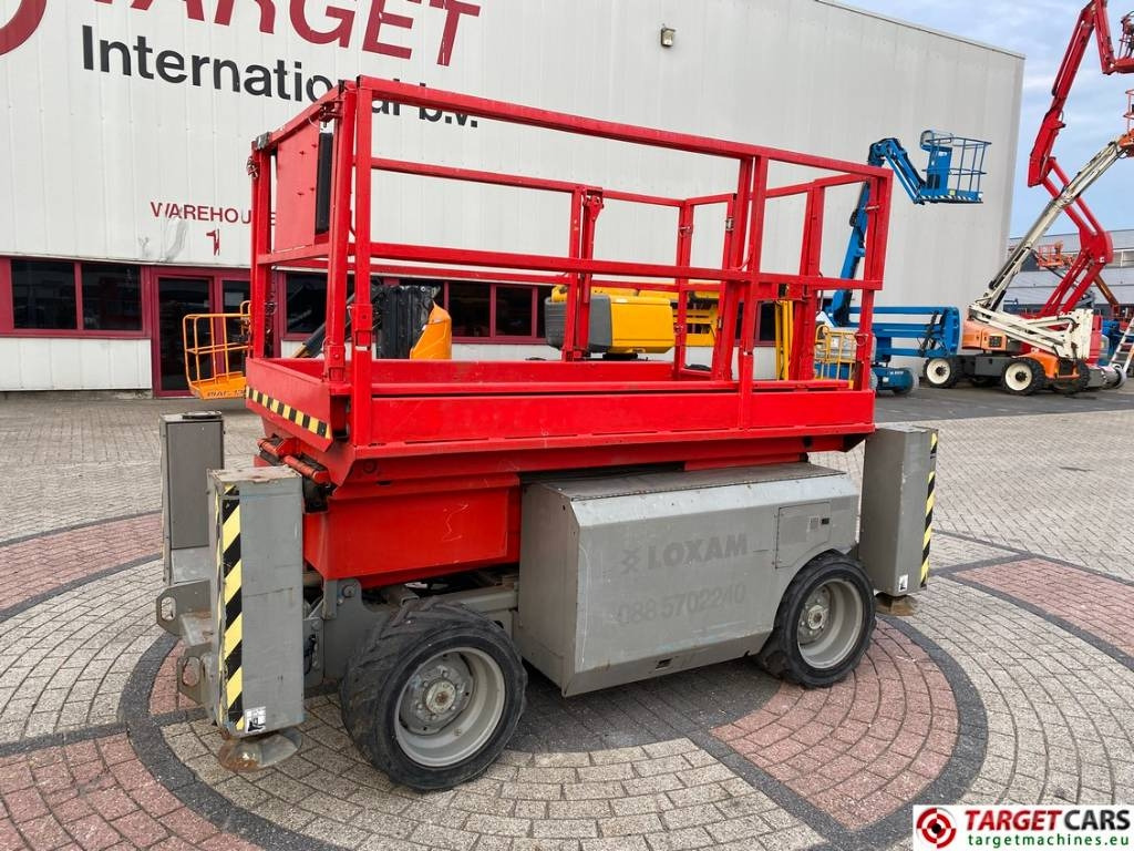 Genie GS-2668RT Diesel 4x4 Scissor Work Lift 992cm - Nacelle ciseaux: photos 1 Genie GS-2668RT Diesel 4x4 Scissor Work Lift 992cm - Nacelle ciseaux: photos 1