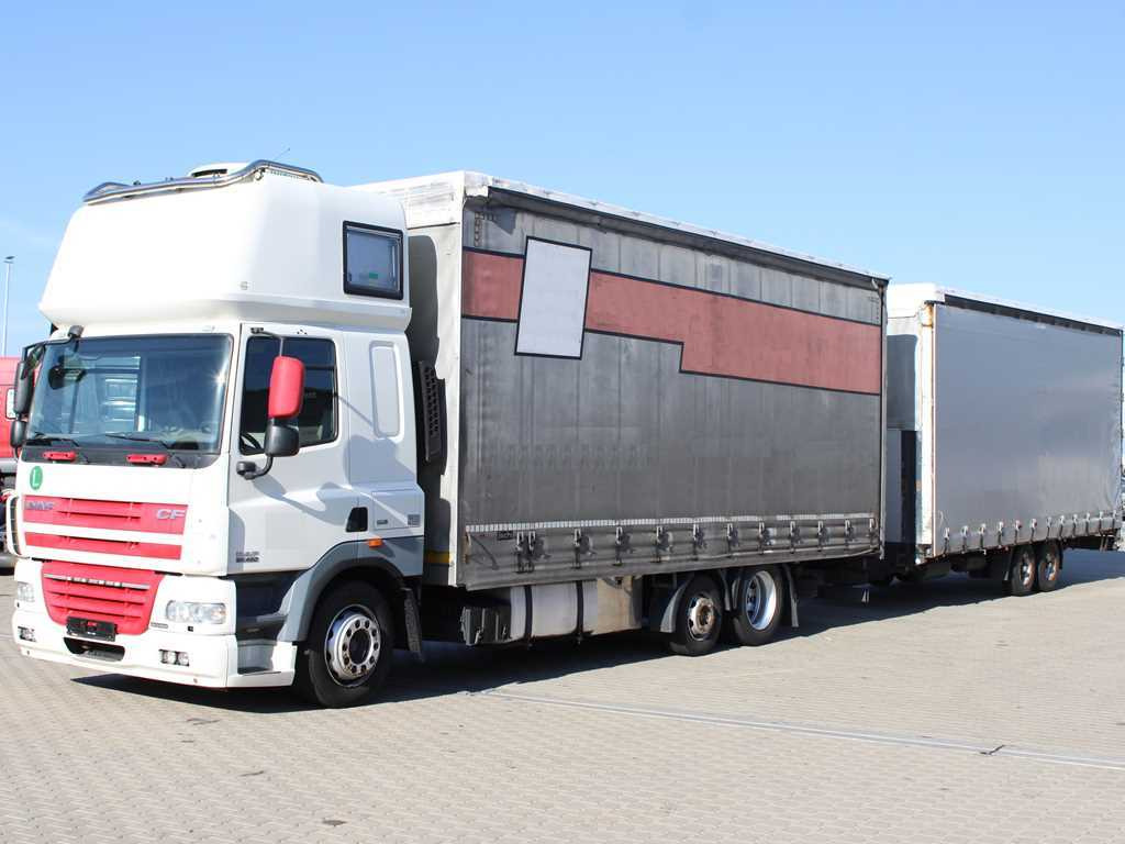 DAF CF 85.460, 6X2, INDEPENDENT AIR CONDITIONING + FLIEGL TPS 100 (2003) - Camion à rideaux coulissants: photos 1 DAF CF 85.460, 6X2, INDEPENDENT AIR CONDITIONING + FLIEGL TPS 100 (2003) - Camion à rideaux coulissants: photos 1