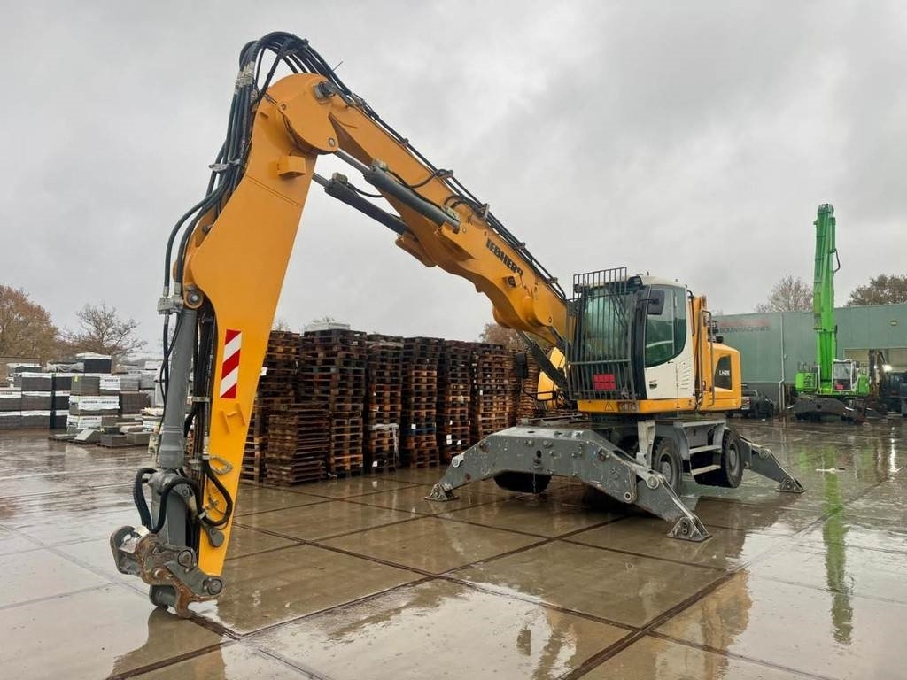 Pelle de manutention Liebherr LH 26 M: photos 8