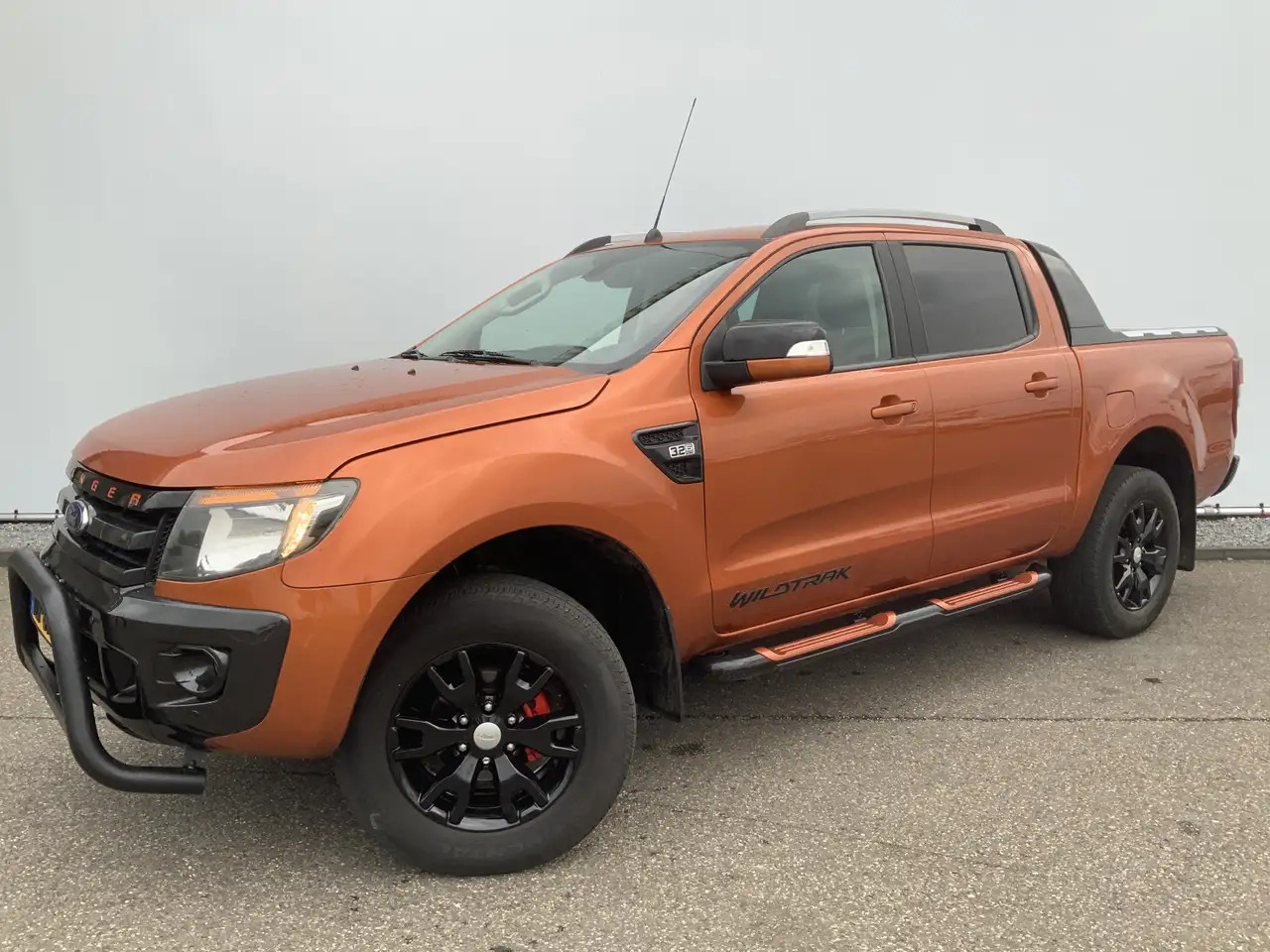 Ford Ranger 3.2 TDCi Wildtrak Super Automaat Cab Airco Cruise - Pick-up: photos 1 Ford Ranger 3.2 TDCi Wildtrak Super Automaat Cab Airco Cruise - Pick-up: photos 1