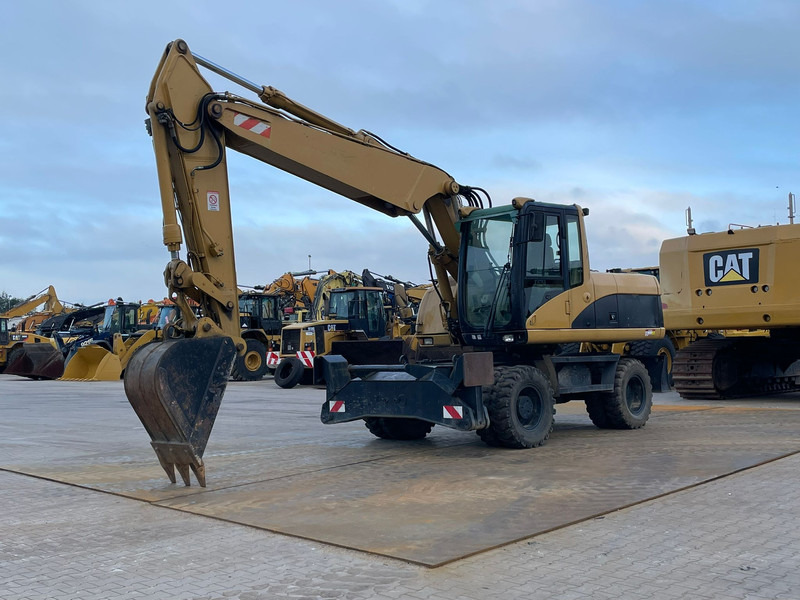 Caterpillar M318C - Pelle: photos 2 Caterpillar M318C - Pelle: photos 2