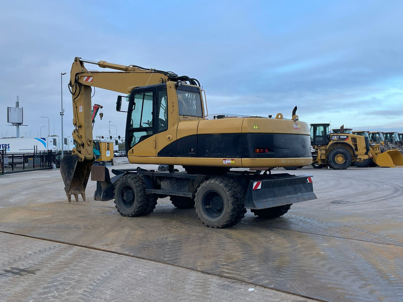 Caterpillar M318C - Pelle: photos 3 Caterpillar M318C - Pelle: photos 3