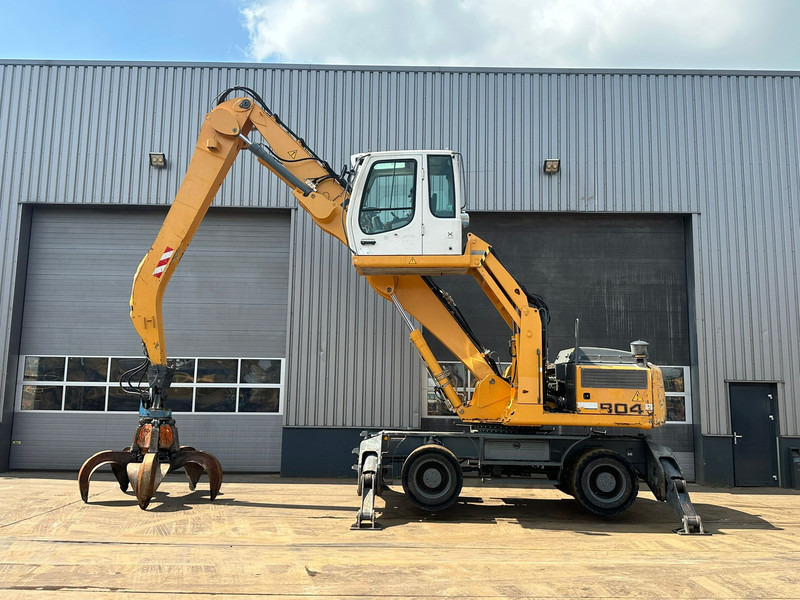 Liebherr A 904 C - Material Handler - Pelle de manutention: photos 1 Liebherr A 904 C - Material Handler - Pelle de manutention: photos 1