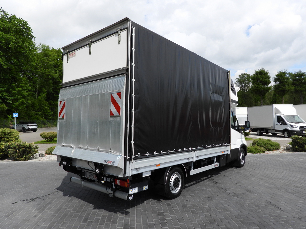 IVECO DAILY 35S18 TARPAULIN LIFT 8 PALLETS WEBASTO CRUISE CONTROL AIR CONDITIONING 180HP - Utilitaire plateau baché: photos 3 IVECO DAILY 35S18 TARPAULIN LIFT 8 PALLETS WEBASTO CRUISE CONTROL AIR CONDITIONING 180HP - Utilitaire plateau baché: photos 3
