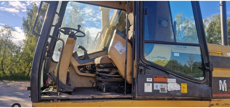 Caterpillar M 315 Rototilt - Pelle sur pneus: photos 5 Caterpillar M 315 Rototilt - Pelle sur pneus: photos 5