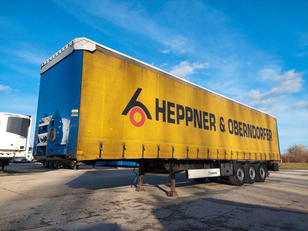 Krone SD Standard Coil Mulde lenkbare Hinterachse - Semi-remorque rideaux coulissants: photos 1 Krone SD Standard Coil Mulde lenkbare Hinterachse - Semi-remorque rideaux coulissants: photos 1