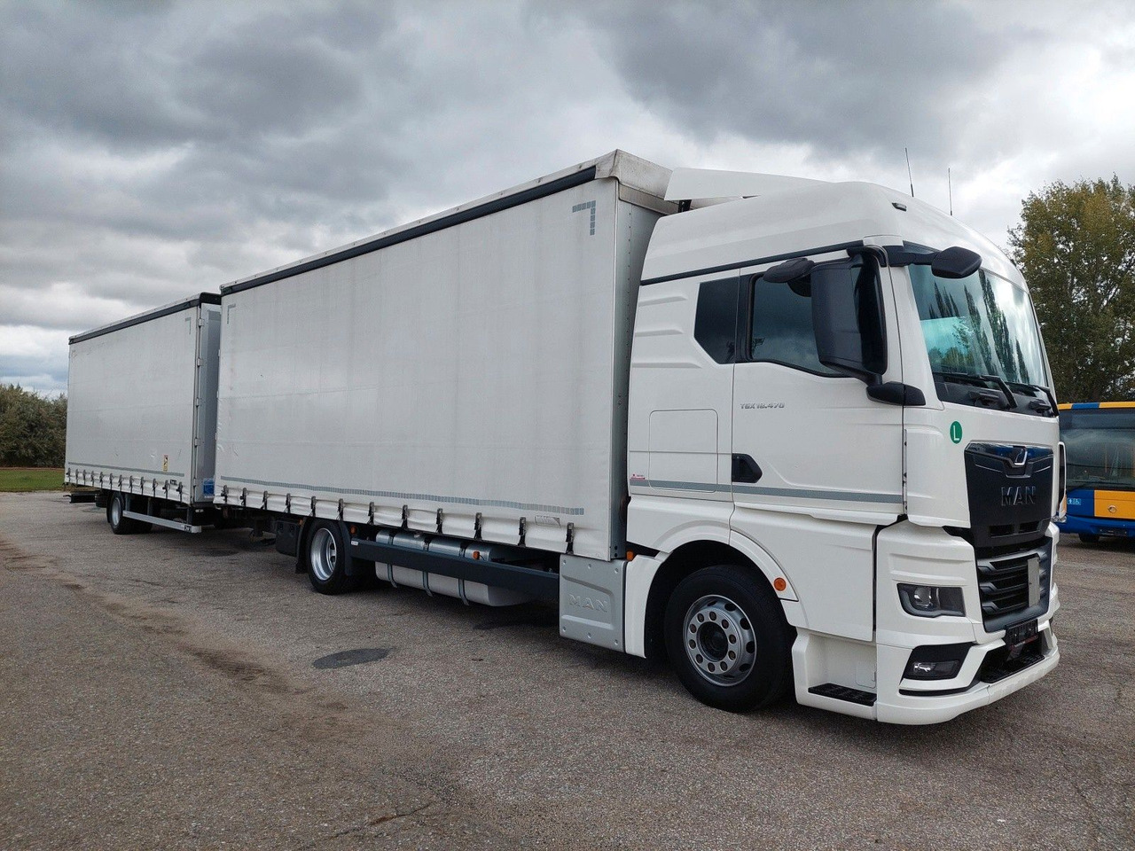 MAN TGX 18.470 LL + Gniotpol G-4080 120 m3 Durchbar - Camion à rideaux coulissants: photos 2 MAN TGX 18.470 LL + Gniotpol G-4080 120 m3 Durchbar - Camion à rideaux coulissants: photos 2