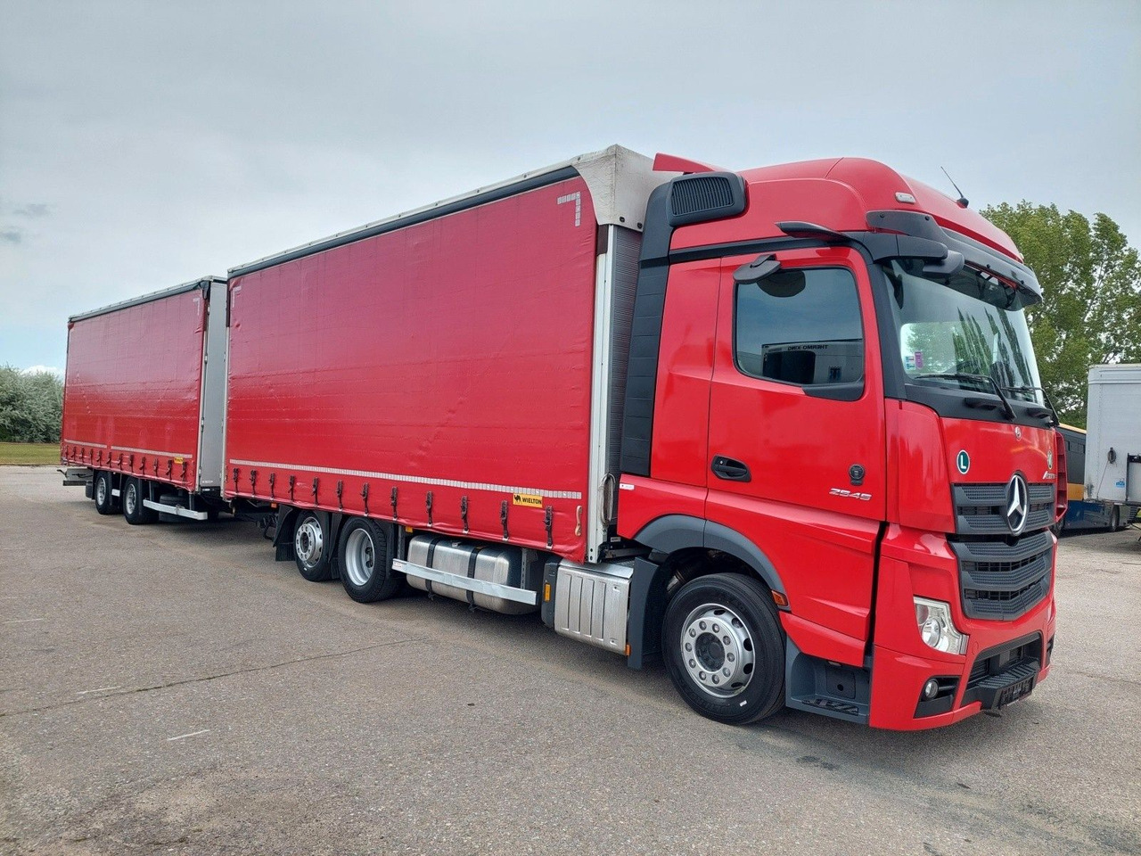 Mercedes-Benz Actros 2545 L/NR 6x2 + Wielton PC2K Durchbar - Camion à rideaux coulissants: photos 2 Mercedes-Benz Actros 2545 L/NR 6x2 + Wielton PC2K Durchbar - Camion à rideaux coulissants: photos 2