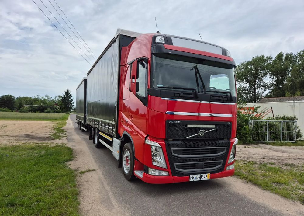 Volvo FH 540 oś skrętna Firanka Euro 6 - Camion à rideaux coulissants: photos 1 Volvo FH 540 oś skrętna Firanka Euro 6 - Camion à rideaux coulissants: photos 1