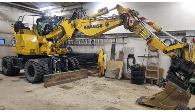 Pelle sur pneus Komatsu PW 138 MR: photos 10 Pelle sur pneus Komatsu PW 138 MR: photos 10