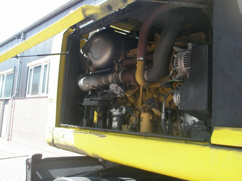 Caterpillar M318F - Pelle sur pneus: photos 5 Caterpillar M318F - Pelle sur pneus: photos 5
