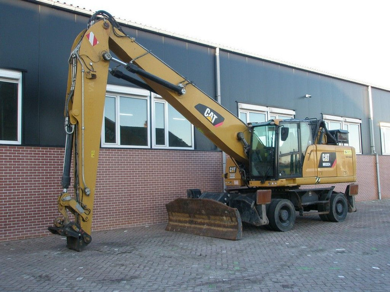 Caterpillar MH3024 - Pelle de manutention: photos 1 Caterpillar MH3024 - Pelle de manutention: photos 1