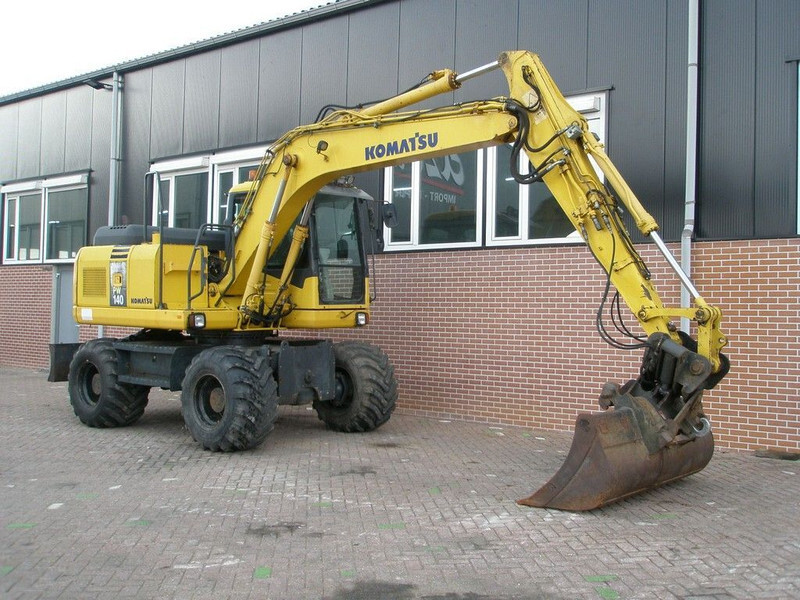 Komatsu PW140-7 - Pelle sur pneus: photos 3 Komatsu PW140-7 - Pelle sur pneus: photos 3