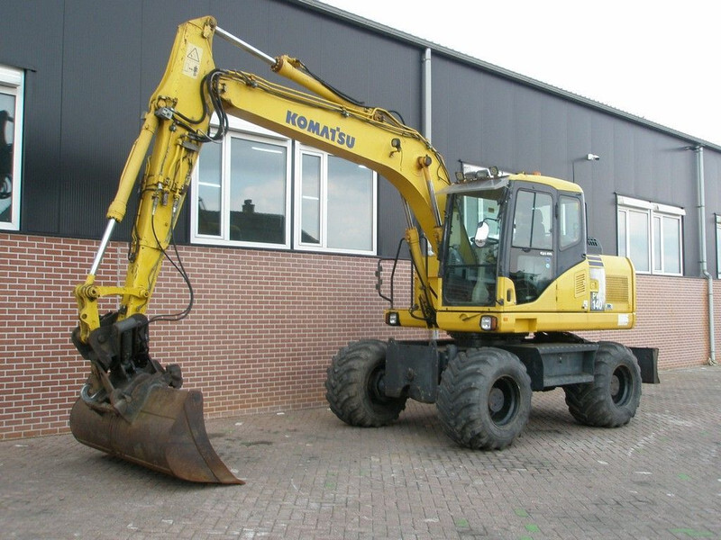 Komatsu PW140-7 - Pelle sur pneus: photos 1 Komatsu PW140-7 - Pelle sur pneus: photos 1