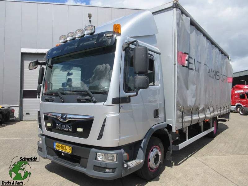 MAN TGL 12.220 TGL EURO 6 - Camion à rideaux coulissants: photos 1 MAN TGL 12.220 TGL EURO 6 - Camion à rideaux coulissants: photos 1