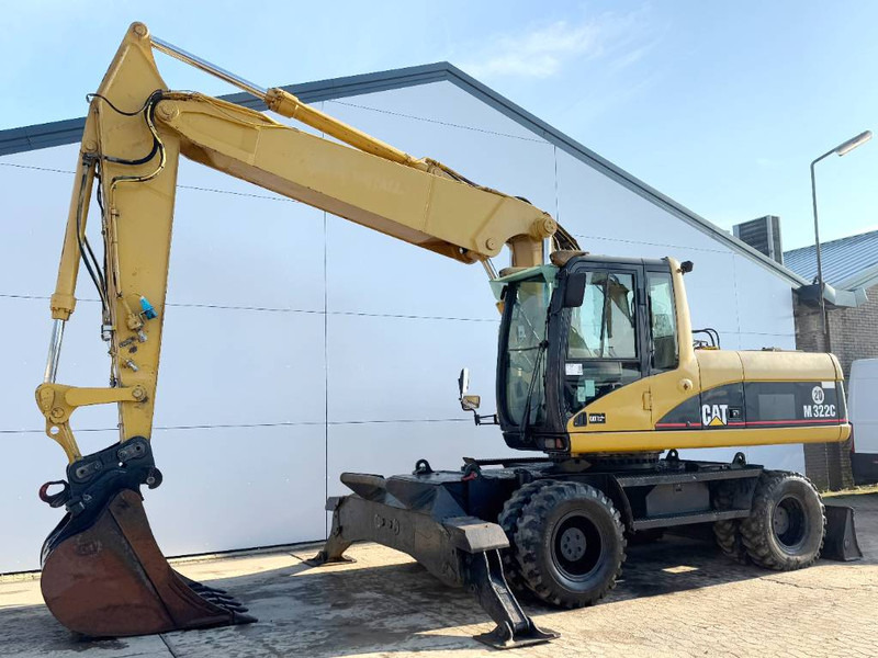 Cat M322C - German Machine / Triple Boom - Pelle sur pneus: photos 2 Cat M322C - German Machine / Triple Boom - Pelle sur pneus: photos 2