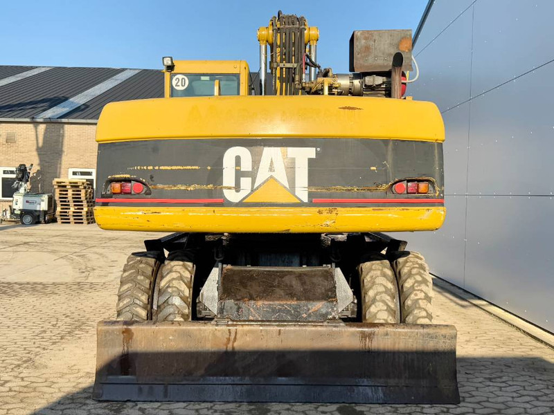 Cat M322C - German Machine / Triple Boom - Pelle sur pneus: photos 4 Cat M322C - German Machine / Triple Boom - Pelle sur pneus: photos 4