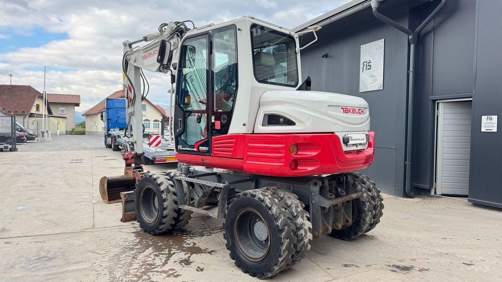 Takeuchi TB295W - 2014 Year - Powertilt - 3X Buckets - Pelle sur pneus: photos 3 Takeuchi TB295W - 2014 Year - Powertilt - 3X Buckets - Pelle sur pneus: photos 3