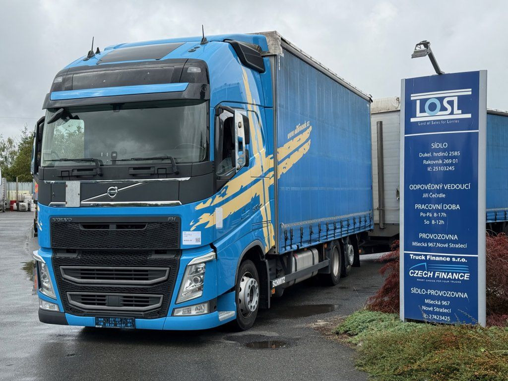 Volvo FH500 6x2 Euro 6 + Schmitz - Camion à rideaux coulissants: photos 1 Volvo FH500 6x2 Euro 6 + Schmitz - Camion à rideaux coulissants: photos 1