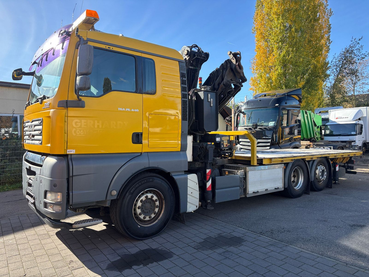 MAN TGA 26.440 FASSI F450AXP Containerauf./Lenkachse - Camion grue: photos 1 MAN TGA 26.440 FASSI F450AXP Containerauf./Lenkachse - Camion grue: photos 1