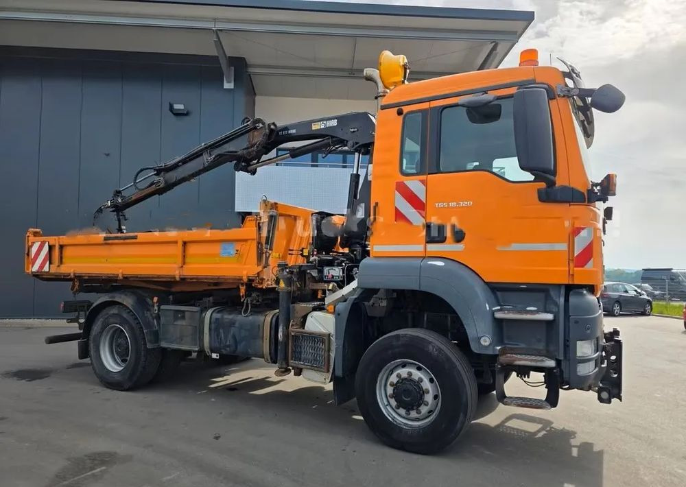 MAN TGS 18.320 4x4 – Wywrotka trójstronna Meiller + Kran HIAB | Komunalny | Euro 5 - Camion benne: photos 1 MAN TGS 18.320 4x4 – Wywrotka trójstronna Meiller + Kran HIAB | Komunalny | Euro 5 - Camion benne: photos 1