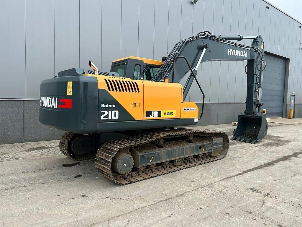 Hyundai R 210 - Pelle sur chenille: photos 5 Hyundai R 210 - Pelle sur chenille: photos 5