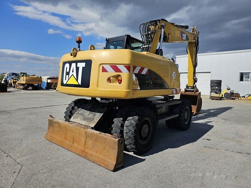 Caterpillar M315D - Pelle sur pneus: photos 3 Caterpillar M315D - Pelle sur pneus: photos 3