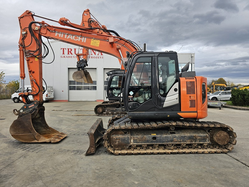 HITACHI ZX135US-6 - Engins de chantier: photos 1 HITACHI ZX135US-6 - Engins de chantier: photos 1