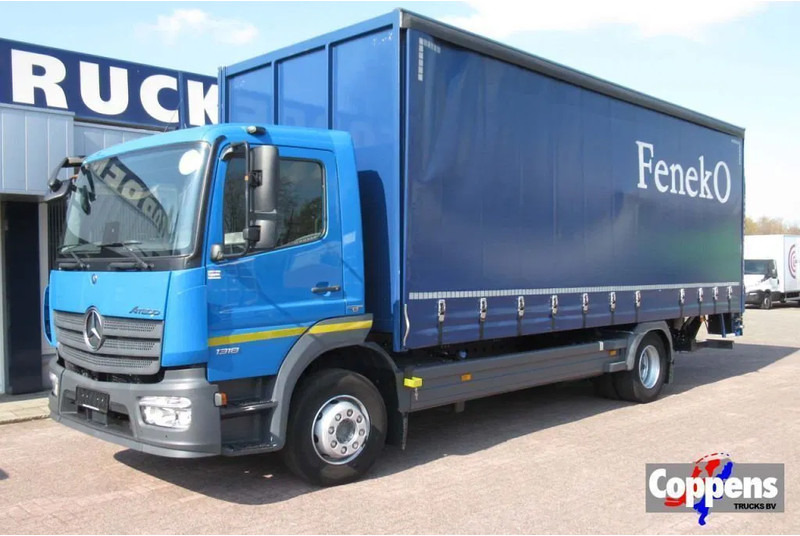Mercedes-Benz Atego 1318L Euro 6 - Camion à rideaux coulissants: photos 1 Mercedes-Benz Atego 1318L Euro 6 - Camion à rideaux coulissants: photos 1