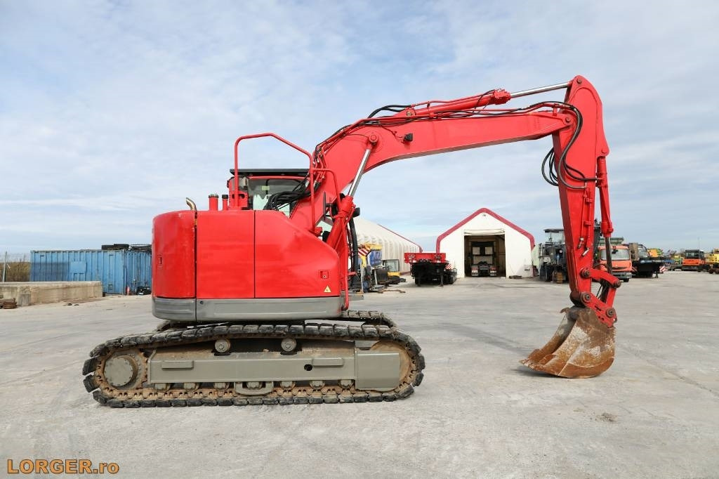 Pelle sur chenille Hyundai Robex 145 LCR: photos 6