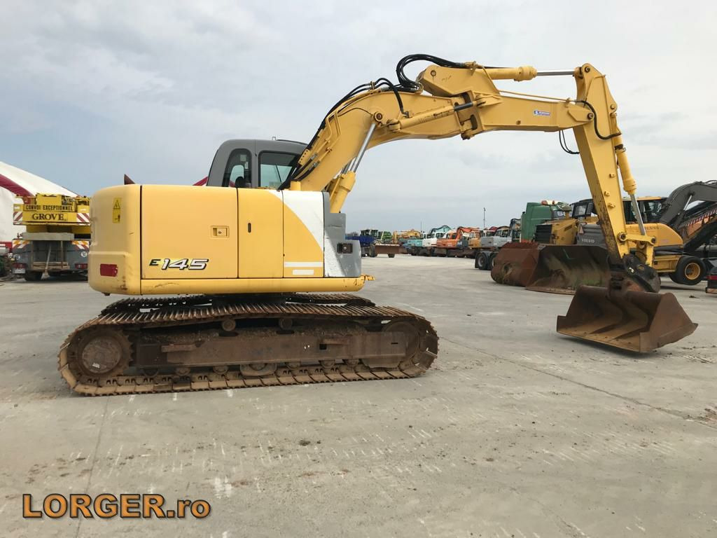 New Holland E 145 - Pelle sur chenille: photos 3 New Holland E 145 - Pelle sur chenille: photos 3
