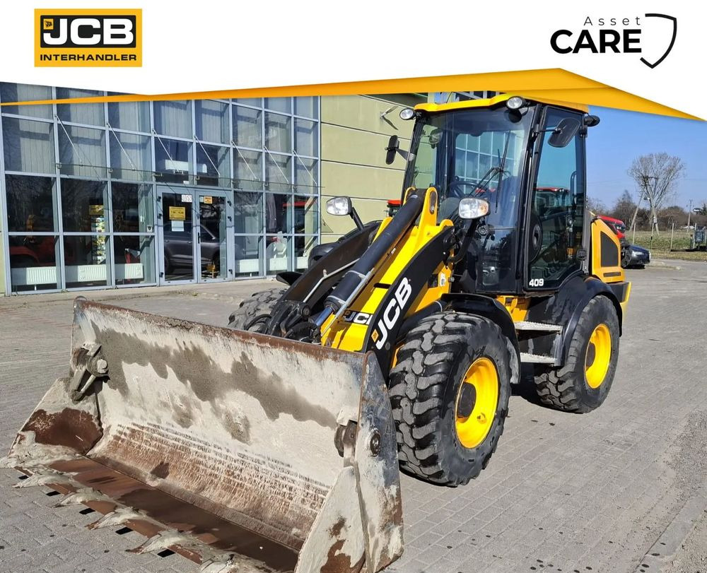 JCB 409 - Pelle sur pneus: photos 1 JCB 409 - Pelle sur pneus: photos 1