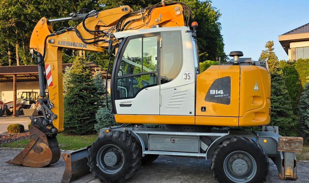 Pelle sur pneus Liebherr A 914 COMPACT: photos 10