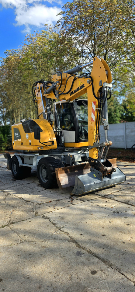 Liebherr A 914 COMPACT - Pelle sur pneus: photos 1 Liebherr A 914 COMPACT - Pelle sur pneus: photos 1