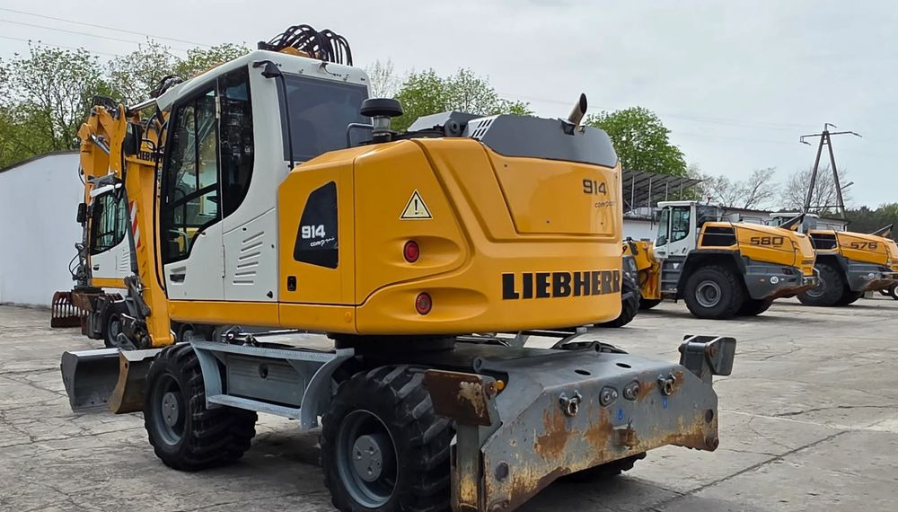 Pelle sur pneus Liebherr A 914 COMPACT: photos 6