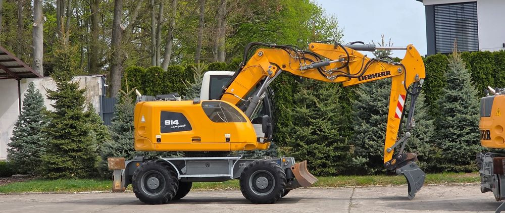 Liebherr A 914 COMPACT - Pelle sur pneus: photos 1 Liebherr A 914 COMPACT - Pelle sur pneus: photos 1