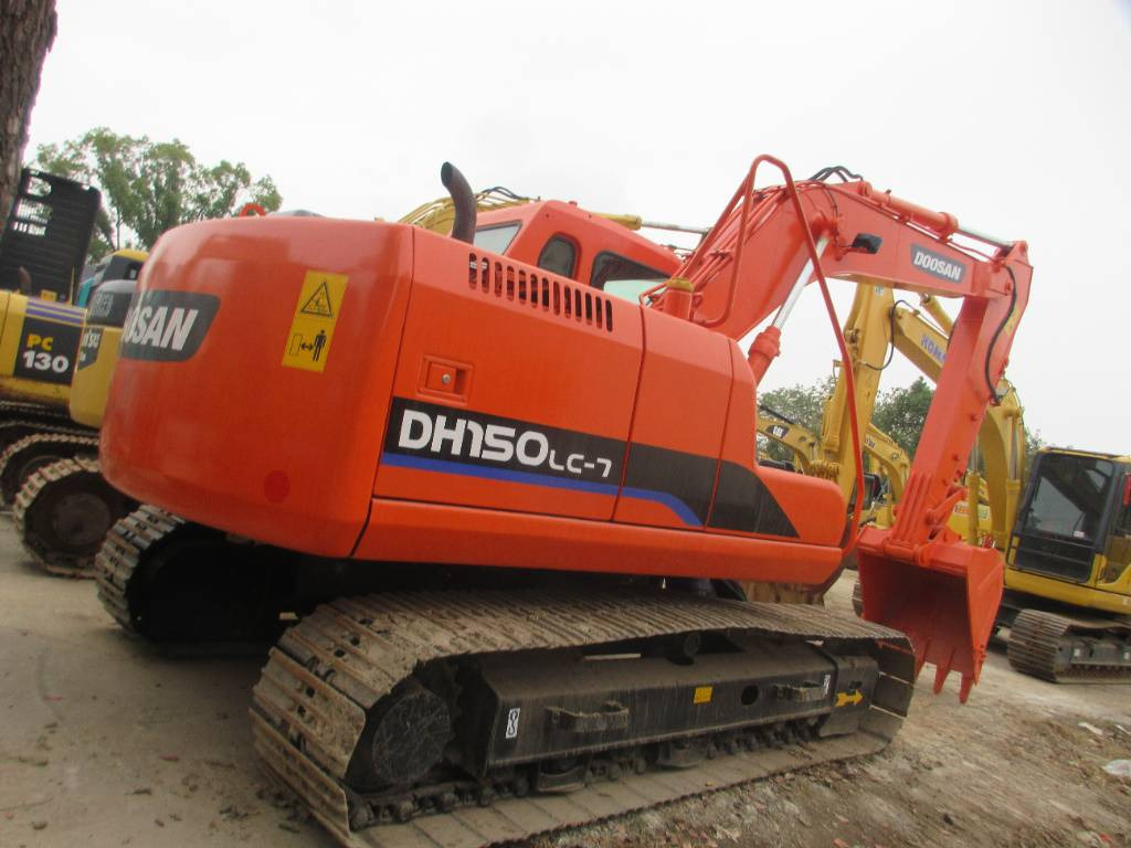 Doosan DH 150 LC-7 - Pelle sur pneus: photos 1 Doosan DH 150 LC-7 - Pelle sur pneus: photos 1