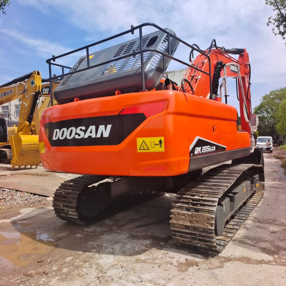 Doosan DX 225 LC-9C - Pelle sur chenille: photos 1 Doosan DX 225 LC-9C - Pelle sur chenille: photos 1