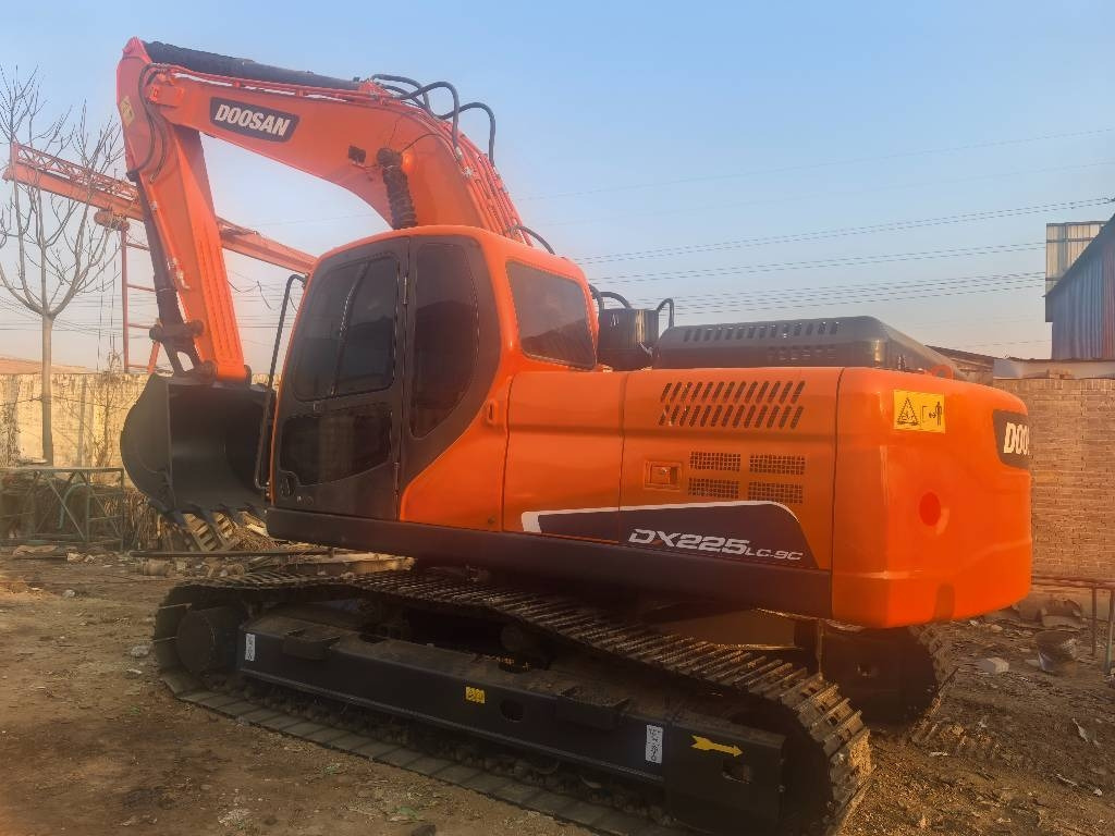 Doosan DX 225 LC - Pelle sur chenille: photos 1 Doosan DX 225 LC - Pelle sur chenille: photos 1