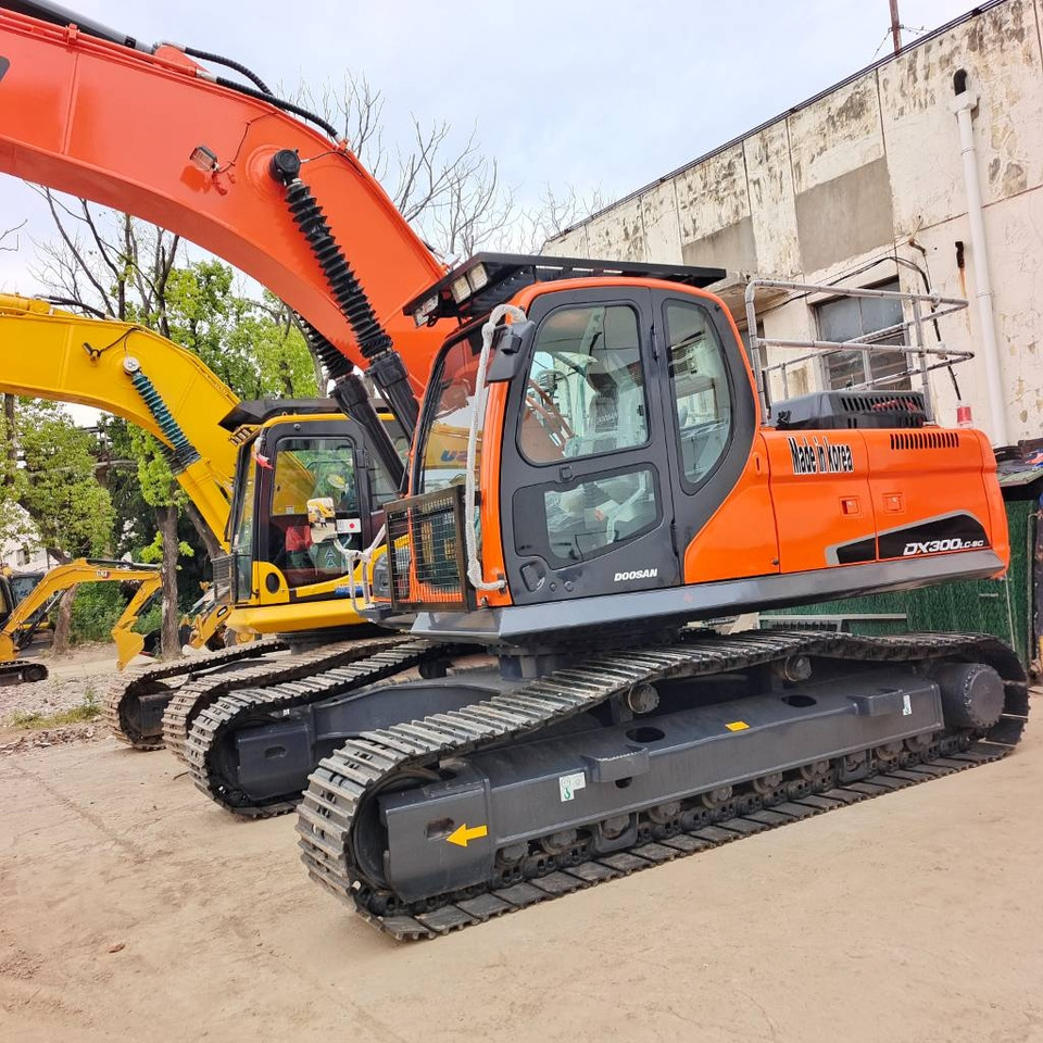Doosan DX 300 - Pelle sur chenille: photos 1 Doosan DX 300 - Pelle sur chenille: photos 1