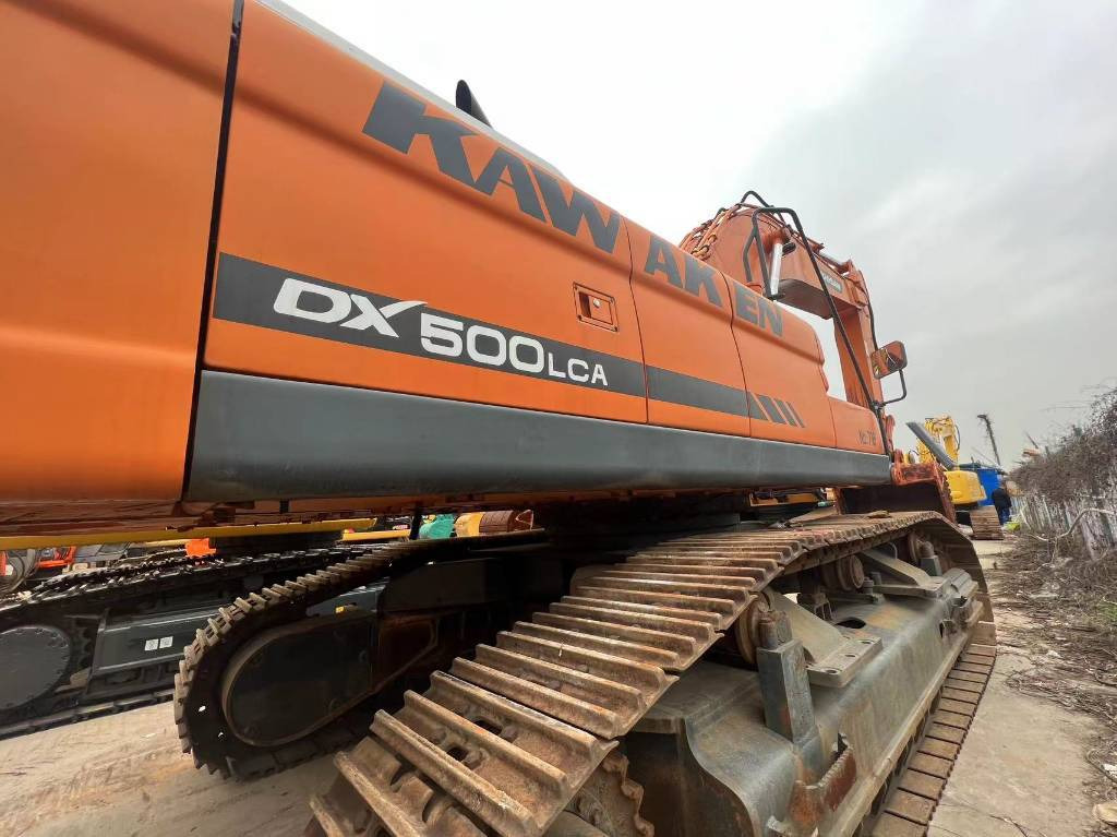Doosan DX 500 LCA - Pelle sur chenille: photos 3 Doosan DX 500 LCA - Pelle sur chenille: photos 3