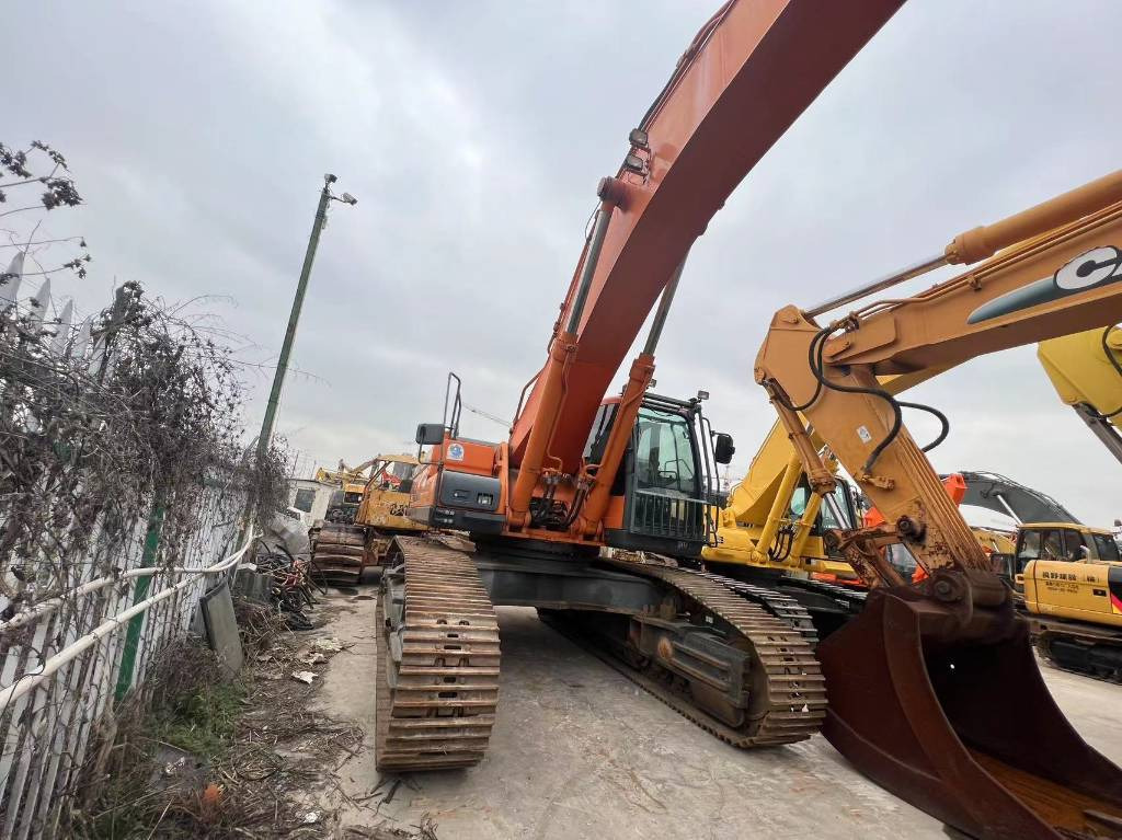 Doosan DX 500 LCA - Pelle sur chenille: photos 2 Doosan DX 500 LCA - Pelle sur chenille: photos 2