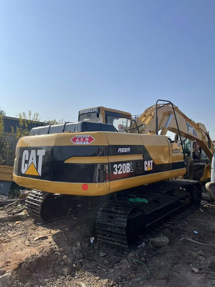 Caterpillar 320BL - Pelle sur chenille: photos 1 Caterpillar 320BL - Pelle sur chenille: photos 1
