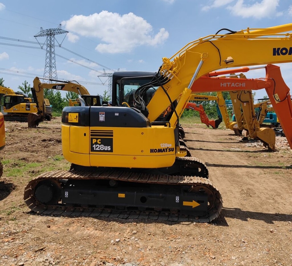 Komatsu PC128US - Pelle sur chenille: photos 3 Komatsu PC128US - Pelle sur chenille: photos 3