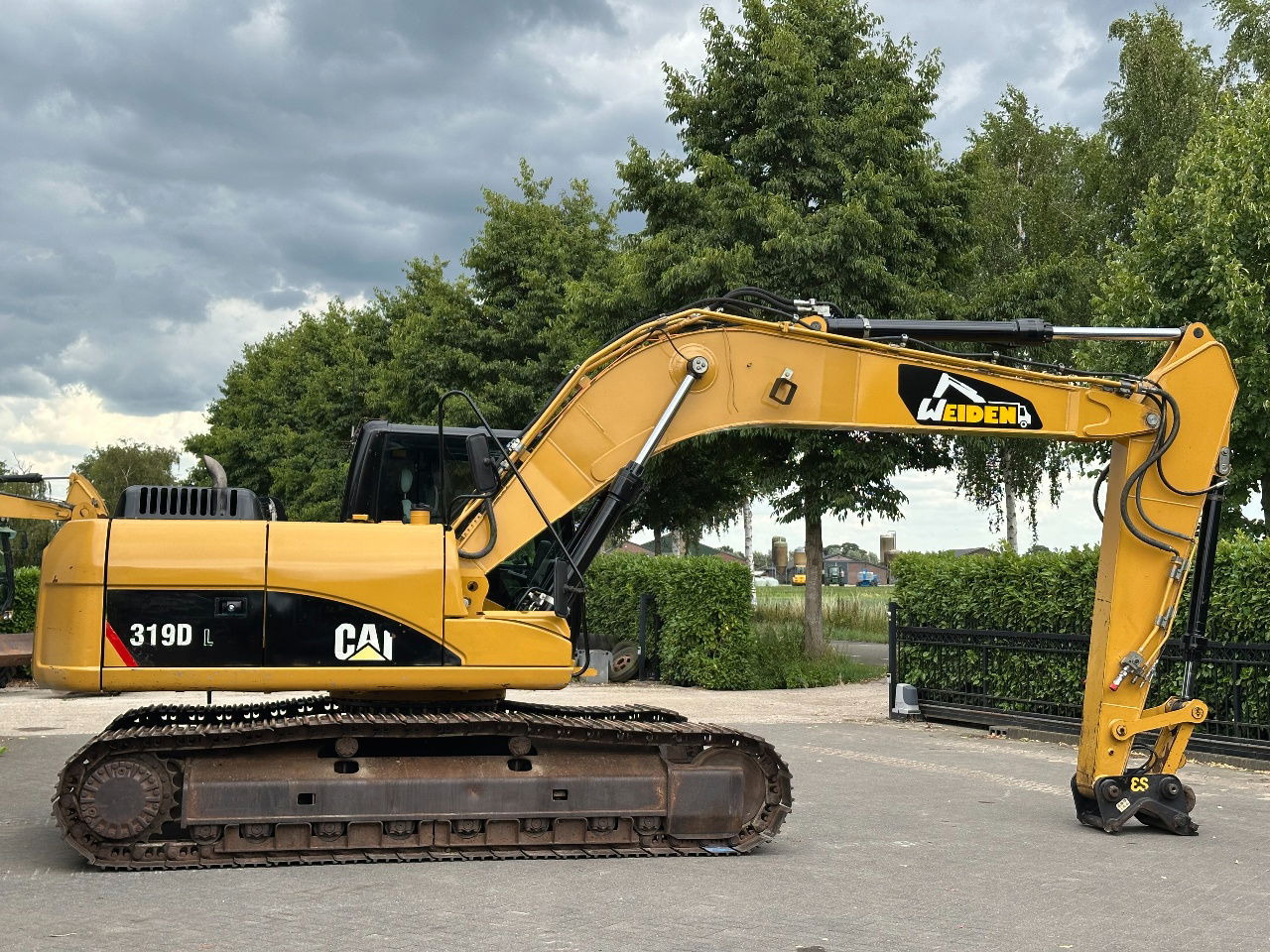 Pelle sur chenille Caterpillar 319D: photos 6