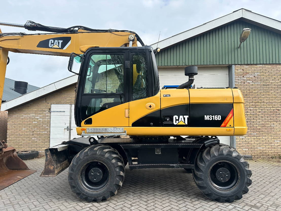 Caterpillar M316D - Pelle sur pneus: photos 4 Caterpillar M316D - Pelle sur pneus: photos 4